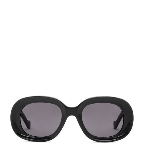 black oversized oval sunglasses